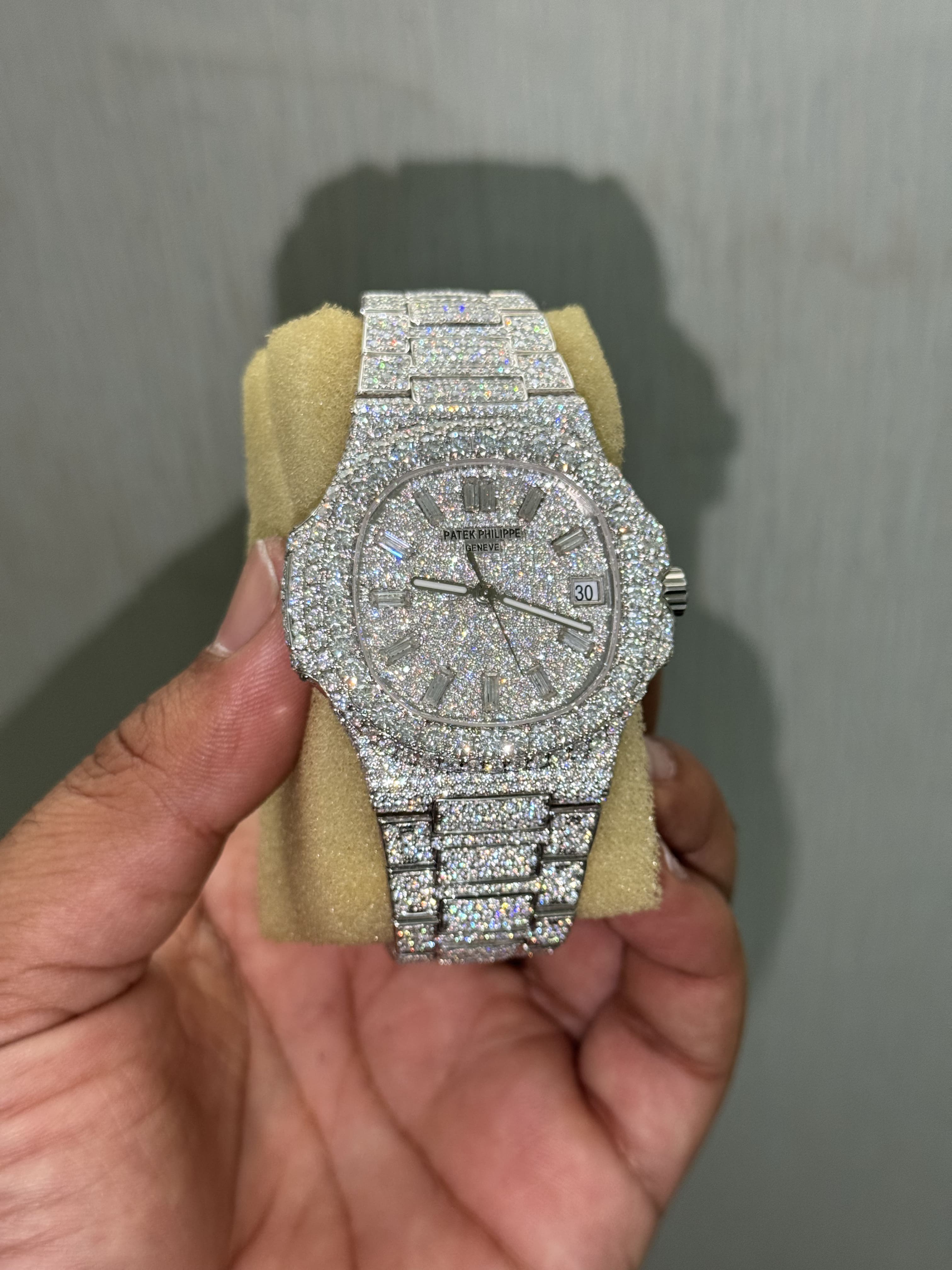 Front view Moissanite Patek Philippe Nautilus watch with full pave diamond dial